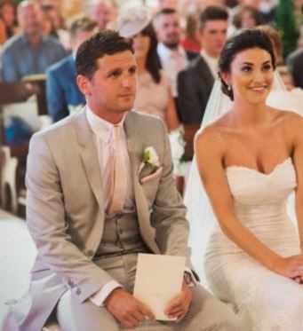 Alex Bruce with his bride Lucy Bruce at their wedding.